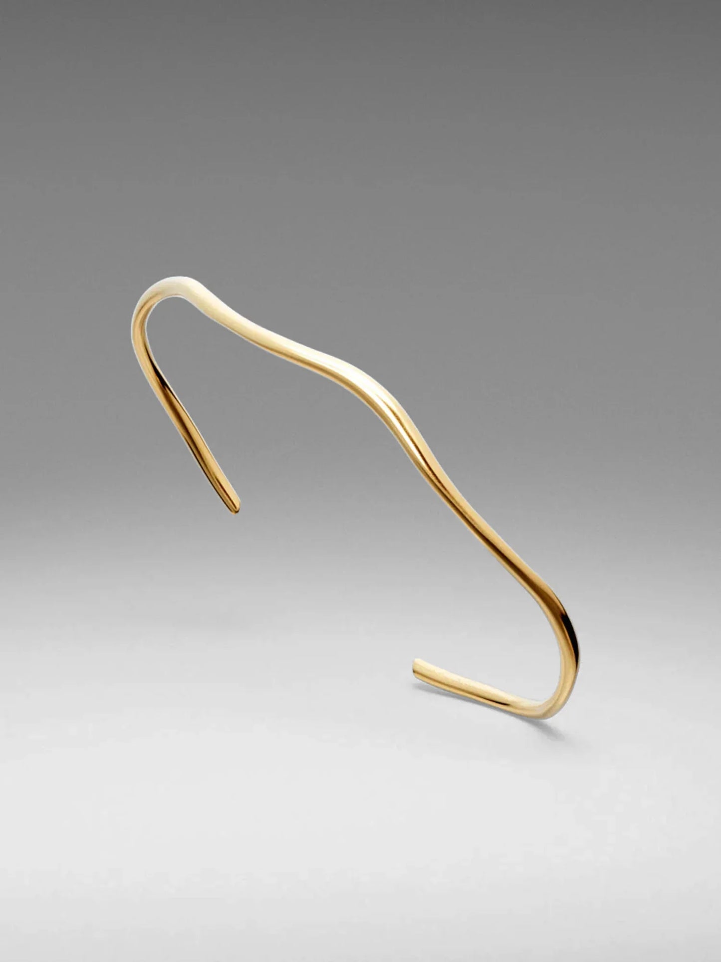 VL. Adjustable Gold Fluid Cuff